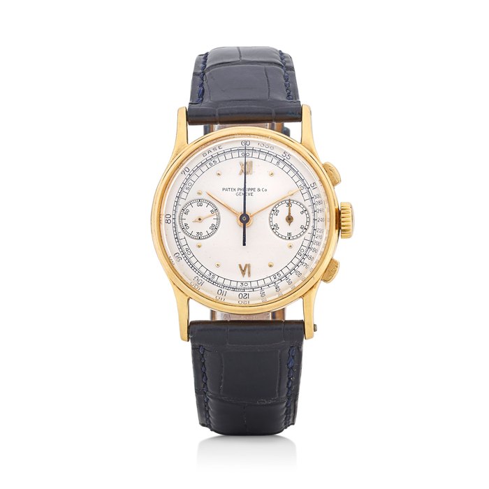 Patek Philippe. An 18K gold wristwatch with chronographRef: 130, sold December 6, 1941