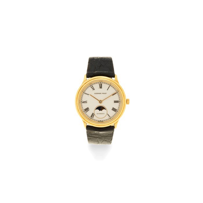Audemars Piguet Audemars Piguet. An 18K gold automatic wristwatch with moon phase Circa 1990
