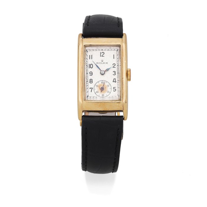 Rolex. A 9K gold manual wind wristwatch Ref: 1879, Circa 1940