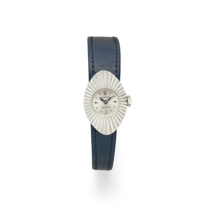 Rolex. A lady's 18K white gold manual wind oval wristwatch with adjustable straps Cameleon Precision, Ref: 9667, Circa 1950