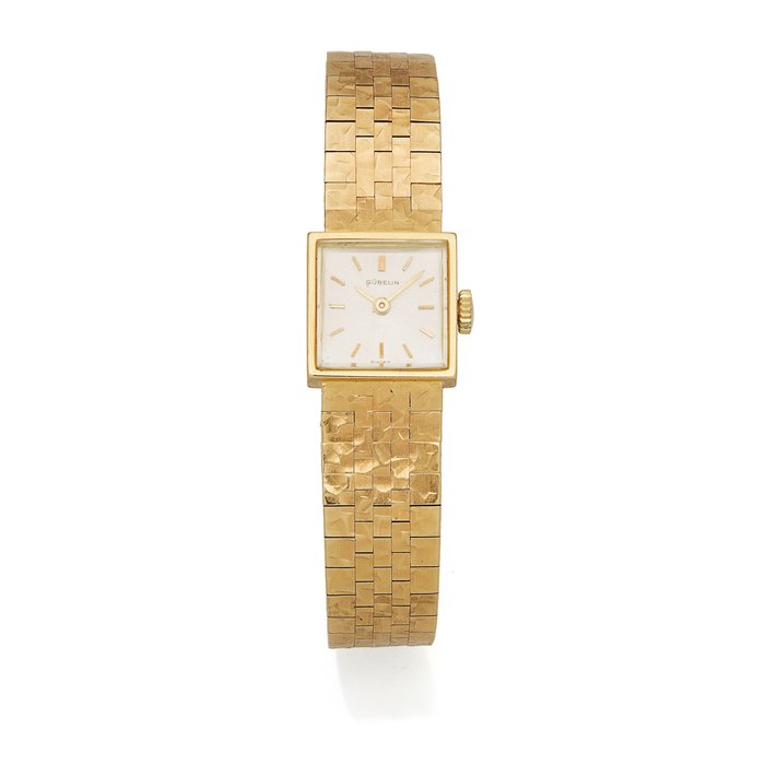 Gübelin. A lady's 18K gold manual wind square bracelet watch Circa 1970
