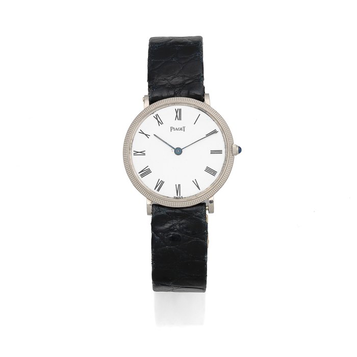 Piaget. A midsize 18K white gold ultra-thin manual wind wristwatch Ref: 9011, Circa 1990