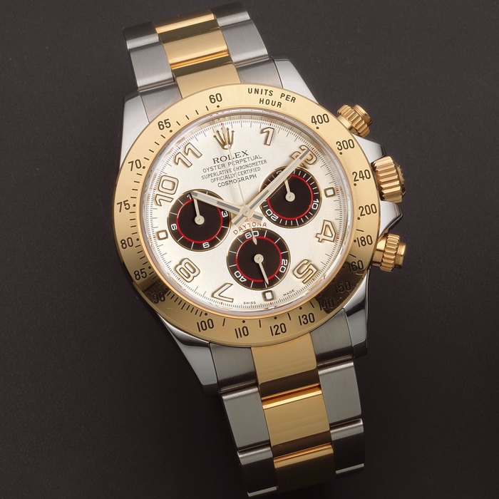 Rolex. A stainless steel and gold automatic calendar chronograph bracelet watch Cosmograph Daytona, Ref: 116523, Sold 29th July 2012
