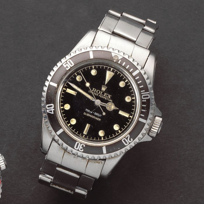 Rolex. A stainless steel automatic bracelet watch with gilt dial Submariner, Ref: 5512, Circa 1960