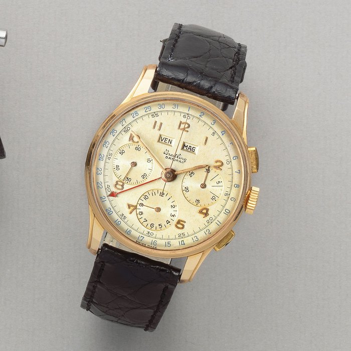 Breitling Breitling. An 18K gold manual wind triple calendar chronograph wristwatch Datora, Ref: 785, Circa 1948, Price & Market Data