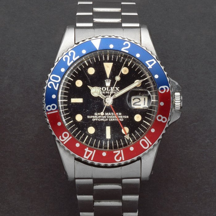 Rolex Rolex. A stainless steel automatic calendar bracelet watch with dual time zone GMT-Master, Ref: 1675, Circa 1963 · 1675