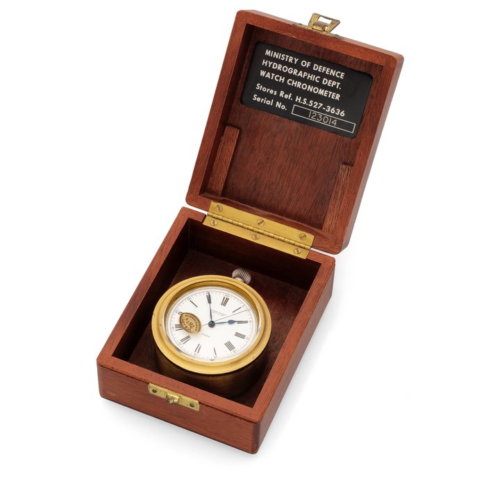 Ulysse Nardin. A wooden cased silver keyless wind open face military chronometer pocket watch