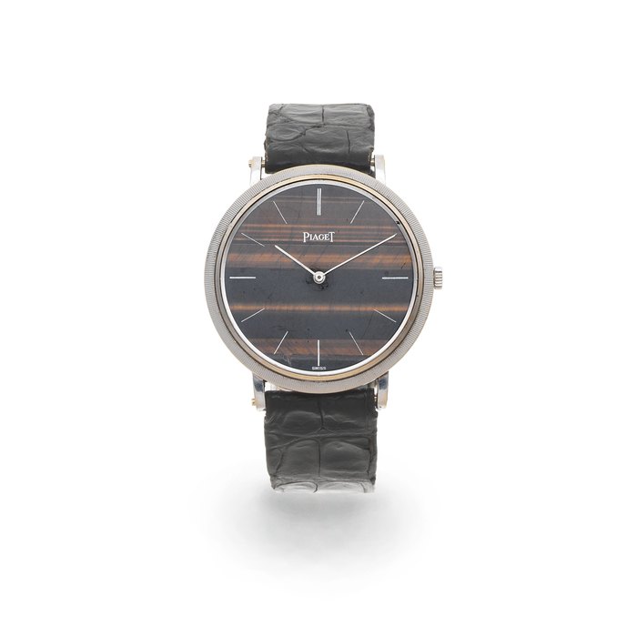 Piaget. An 18K white gold manual wind wristwatch with tigers eye dial Ref: 9023, Circa 1980