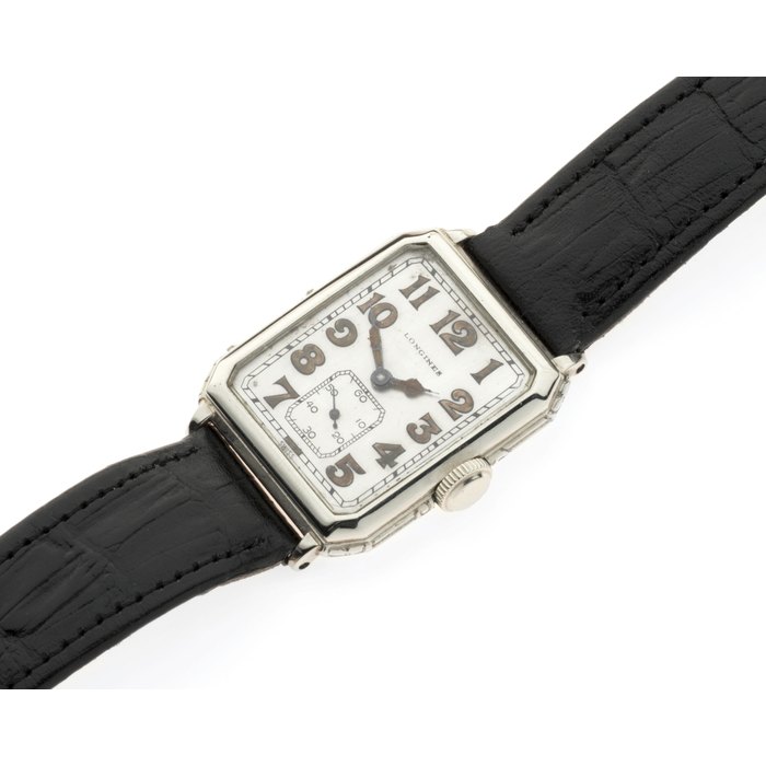 Longines. A white gold plated manual wind rectangular wristwatch