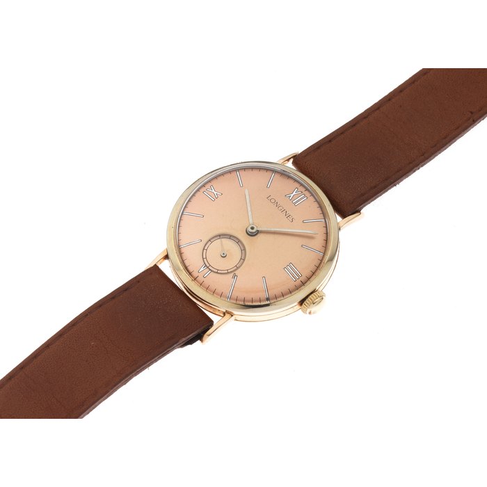 Longines. A gold plated manual wind wristwatch Ref. 846