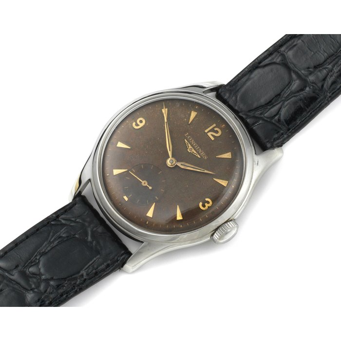 Longines. A stainless steel manual wind wristwatch Ref. 109