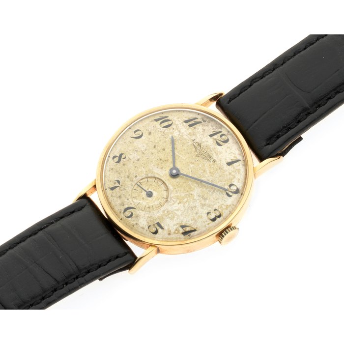 Longines. An 18K gold manual wind wristwatch Ref. 4140