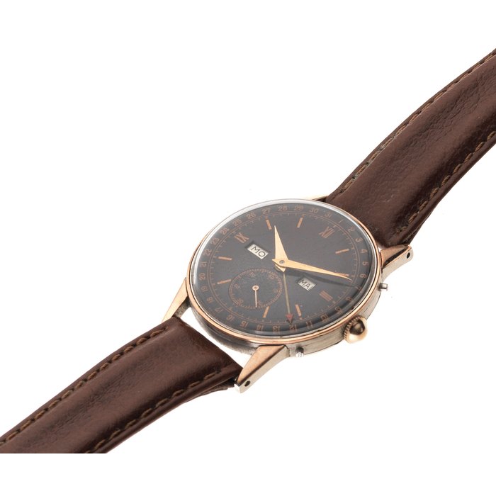 Movado. A rose gold plated and stainless steel manual wind triple calendar wristwatch Ref. 14786