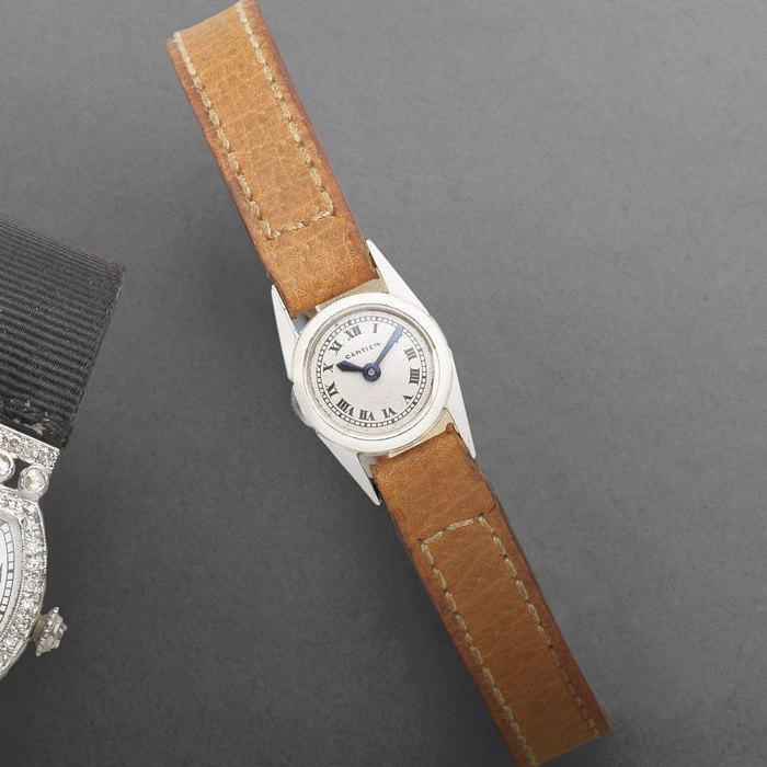 Jaeger-LeCoultre Cartier. A very unusually small platinum lady's manual wind wristwatch Case No.79187 and 34647, Movement No.73842, Circa 1935