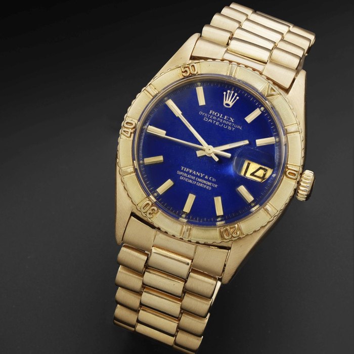 Tiffany & Co Rolex. An 18K gold automatic calendar bracelet watch retailed by Tiffany & Co Datejust Turn-O-Graph, Ref:6609, Serial No.328***, Movement No.N72****, Circa 1957