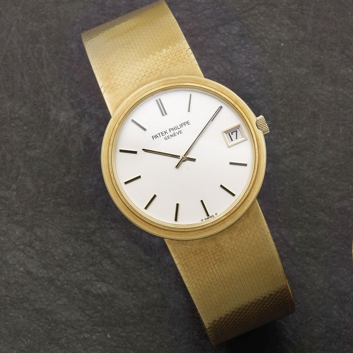 Patek Philippe. An 18K gold automatic calendar bracelet watch Calatrava, Ref:3601-1, Case No.524070, Movement No.1300619, Circa 1970