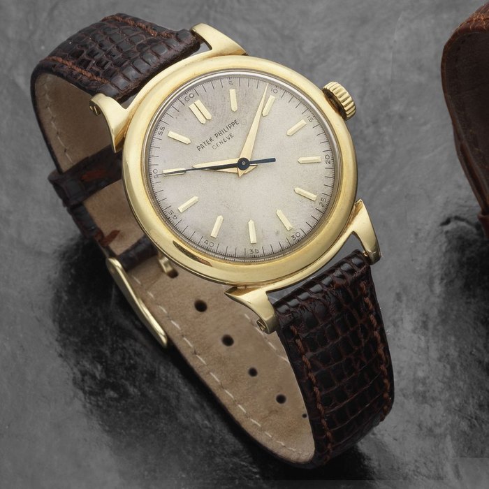 Patek Philippe. An 18K gold manual wind wristwatch with scrolled lugs Ref:1491, Case No.663.420, Movement No.701.070, Sold 12th December 1951
