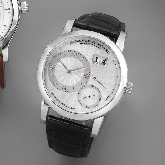 A. Lange & Söhne. A fine 18K white gold manual wind calendar wristwatch with power reserve Lange 1 Soiree, Ref:110.030, Case No.149901, Movement No.38405, Sold 31st March 2007