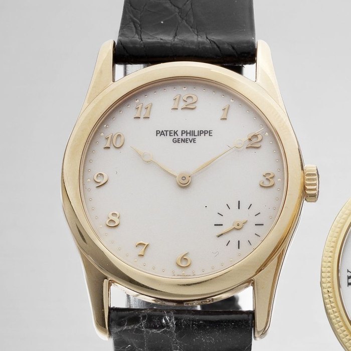 Patek Philippe Patek Phillipe. An 18K rose gold automatic wristwatch Calatrava for Hausmann & Co, Ref:5000F, Case No.2955068, Movement No.801074, 1994