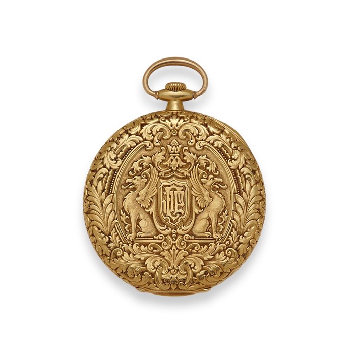 Patek Philippe. A finely chased and engraved 18K gold open face dress watch and a chainCase no. 408041, Movement no. 199700, circa 1929