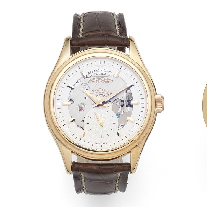 Armand Nicolet. An 18K rose gold manual wind semi-skeletonised wristwatch Ref:AN7140-A, No.069/135, Case No.31389, Sold 27th September 2005