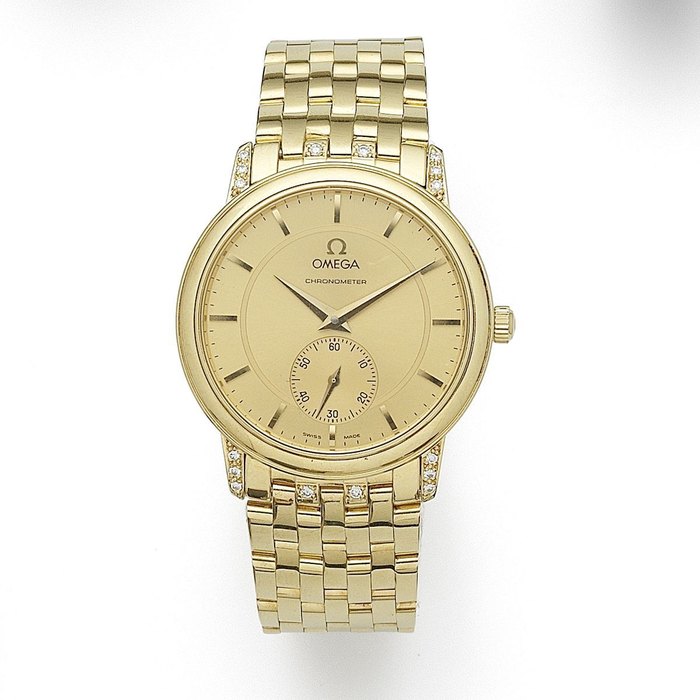 Omega. An 18K gold and diamond set manual wind bracelet watch Ref:1250050/3250050, Case & Movement No.61000025, Sold 21st November 1995