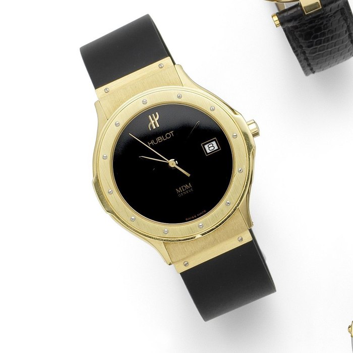 Hublot. An 18K gold quartz calendar wristwatch MDM, Ref:1521.3, Case No.238895, Sold 15th July 1991