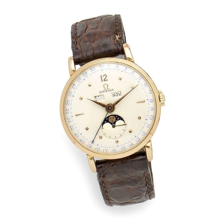 Omega. An 18K gold manual wind triple calendar wristwatch with moon phase Ref:2473, Case No.10803706, Movement No.10937336, Circa 1944