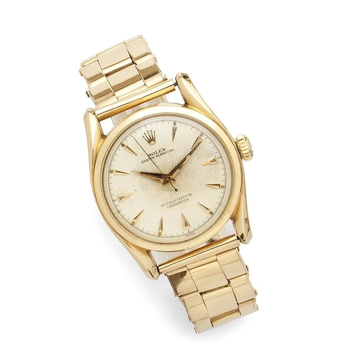 Rolex. An 18K rose gold automatic bracelet watch Bombay, Ref:6090, Serial No.855***, Movement No.359**, Circa 1963