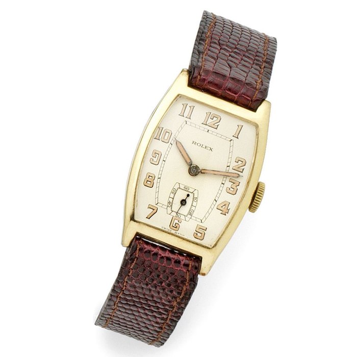 Rolex. A 9K gold manual wind tonneau wristwatch Ref:578, Serial No.103***, Circa 1940