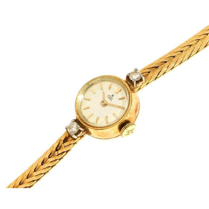 Ebel. A lady's 18K gold and diamond set manual wind bracelet watch