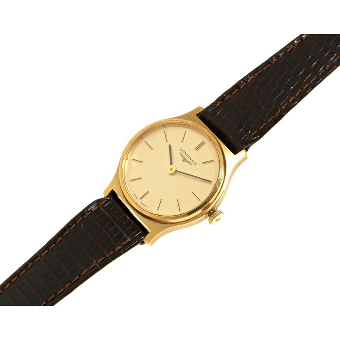 Longines. A lady's gold plated manual wind wristwatch Ref. 289