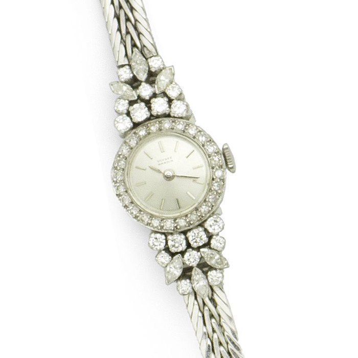 Ulysse Nardin. A lady's 18K white gold and platinum diamond set manual wind bracelet watch Circa 1965