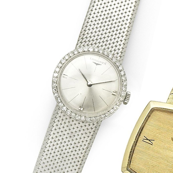Longines. A lady's 18K white gold and diamond set manual wind bracelet watch Movement No.12277949, Circa 1962