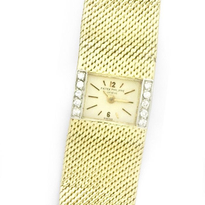 Patek Philippe. A lady's 18K gold and diamond set manual wind bracelet watch Ref:3319/1, Case No.2632657, Movement No.980819, Circa 1965