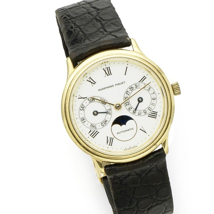 Audemars Piguet. An 18k gold automatic calendar wristwatch with moon phase Case Numbered:C 20953, Movement No.283574, Circa 1980