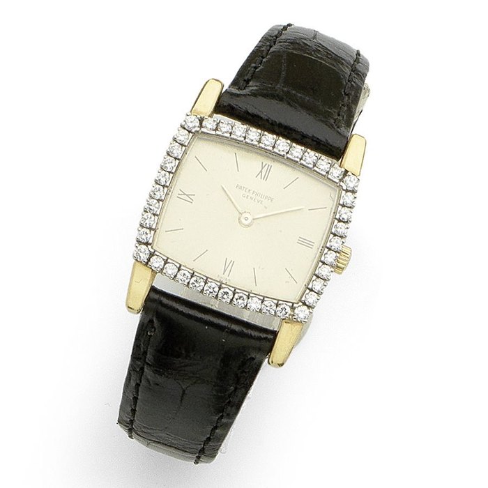 Patek Philippe. A lady's 18K gold and diamond set manual wind wristwatch Ref:3353/1, Case No.2671078, Movement No.996682, Circa 1970