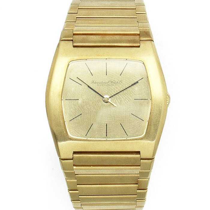 IWC International Watch Company. An 18K gold manual wind tonneau bracelet watch Case No.2080012, Circa 1980