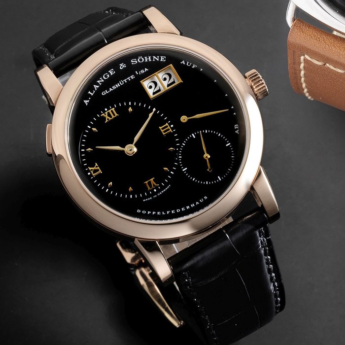 A. Lange & Söhne. A fine 18K rose gold manual wind calendar wristwatch with power reserve Lange 1, Ref:101.031, Case No.119833, Movement No.12099, Sold 15th October 1999