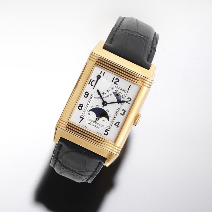 Jaeger-LeCoultre. A rectangular 18K rose gold manual wind reversible wristwatch with day and night indication, moon phase and power reserve Reverso Sun and Moon, Ref:270.2.63. Case No.1926771, Movement No.2927642, Circa 2007