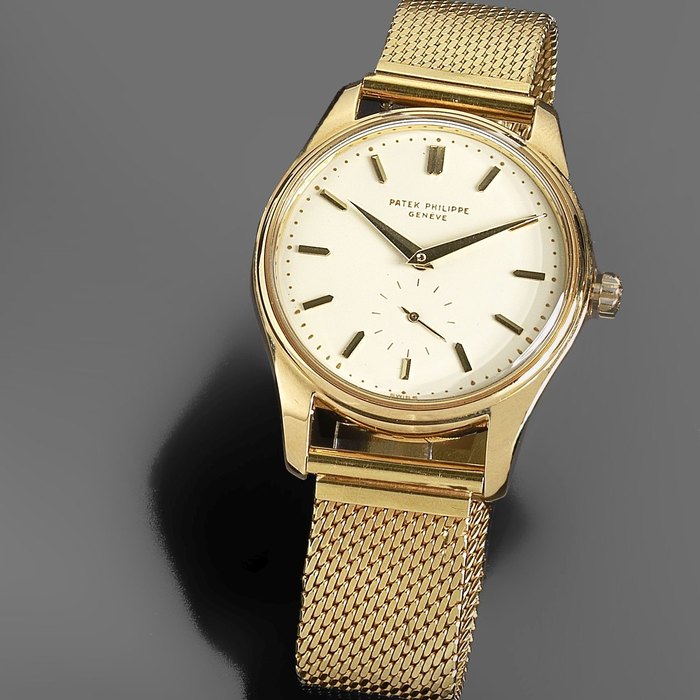 Patek Philippe. A rare and unusual 18K gold automatic calendar bracelet watch Calatrava, Ref:2526, Case No.2606826, Movement No.766467, Circa 1960