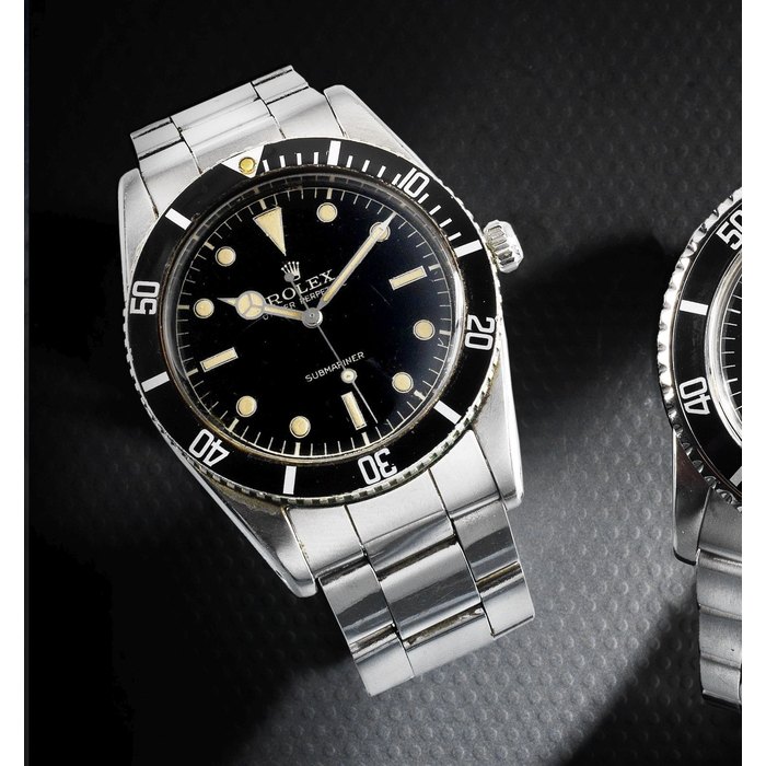 Rolex. A stainless steel tonneau automatic bracelet watch Submariner, Ref:6204/0, Serial No.988***, Movement No.632**, Circa 1960