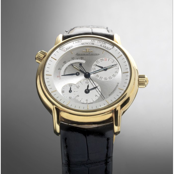 Jaeger-LeCoultre. An 18K gold automatic calendar wristwatch with dual time zone and power reserve Master Control Geographique, Ref:169.1.92, No.0646, Movement No.2482574, Sold 6th September 1995