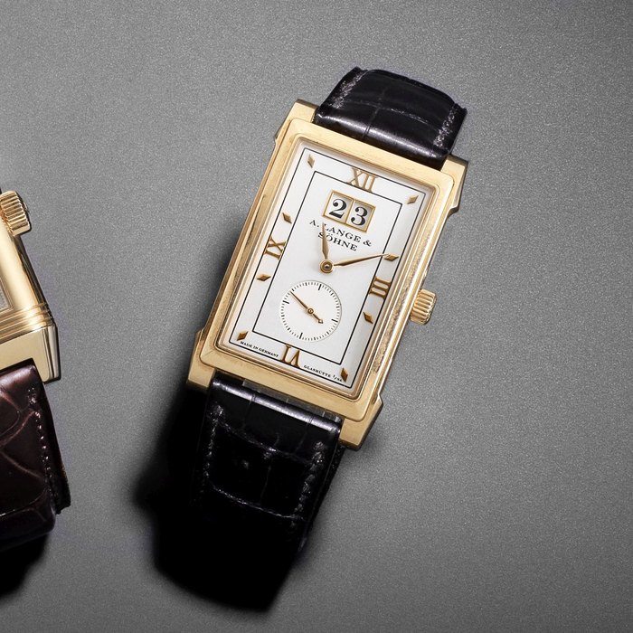 A. Lange & Söhne. An 18K rose gold manual wind calendar rectangular wristwatch Cabaret, Case No.120790, Circa 2000