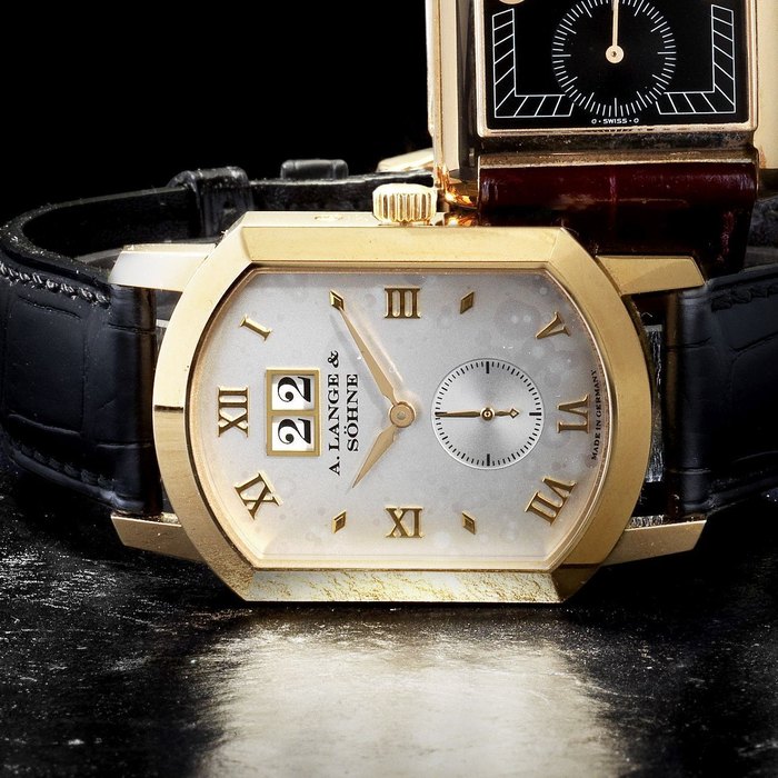 A. Lange & Söhne. An 18K rose gold manual wind calendar wristwatch Grande Arkade, Ref:106.032, Case No.146325, Movement No.26346, Sold 1st March 2003