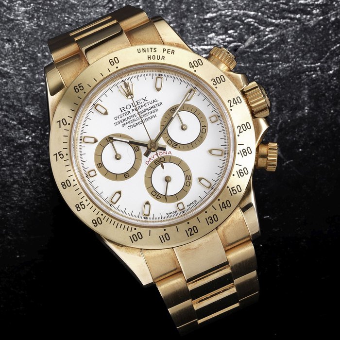 Rolex Rolex. An 18K gold automatic chronograph bracelet watch Cosmograph Daytona, Ref:116528, Serial No.P95****, Movement No.C 002****, Sold 31st May 2002 · 116528