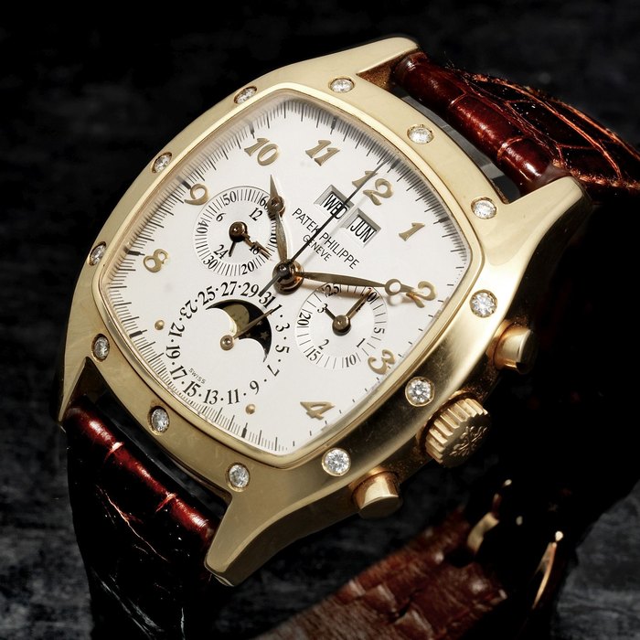 Patek Philippe. A fine 18k rose gold cushion form manual wind perpetual calendar chronograph wristwatch with moon phase Ref:5020R, Case No.2956246, Movement No.3045183, Circa 2010