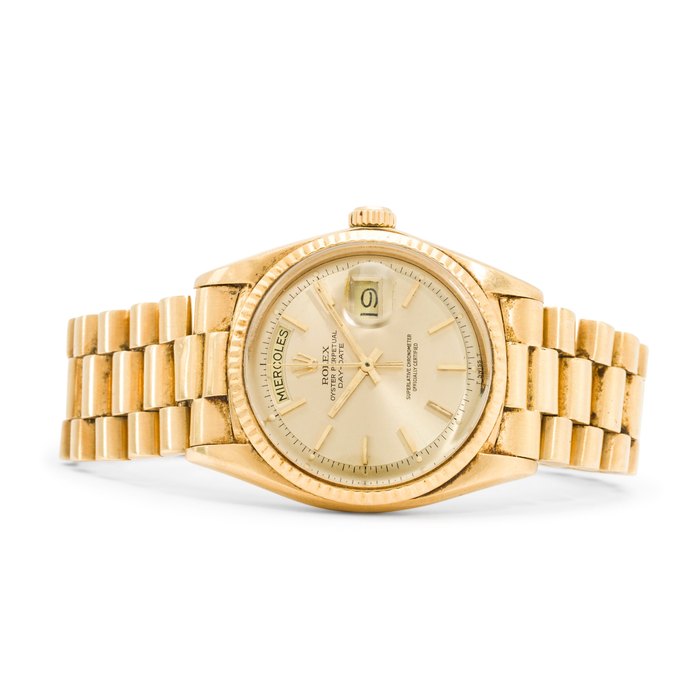 Rolex. An 18K rose gold automatic center seconds bracelet watch with day and dateOyster Perpetual Day-Date, Ref:1803, Case no. 2804178, circa 1970