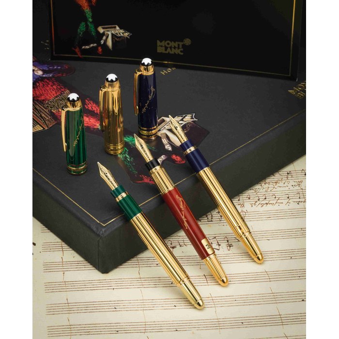 Montblanc. A fine limited Special Edition 2006 Mozart three fountain pens in lapis lazuli, malachite, coral lacquer with box and paper Ref:M20114/M22114/M23214, No.1184/2006 0628/2006 1814/2006, manufactured in 2006