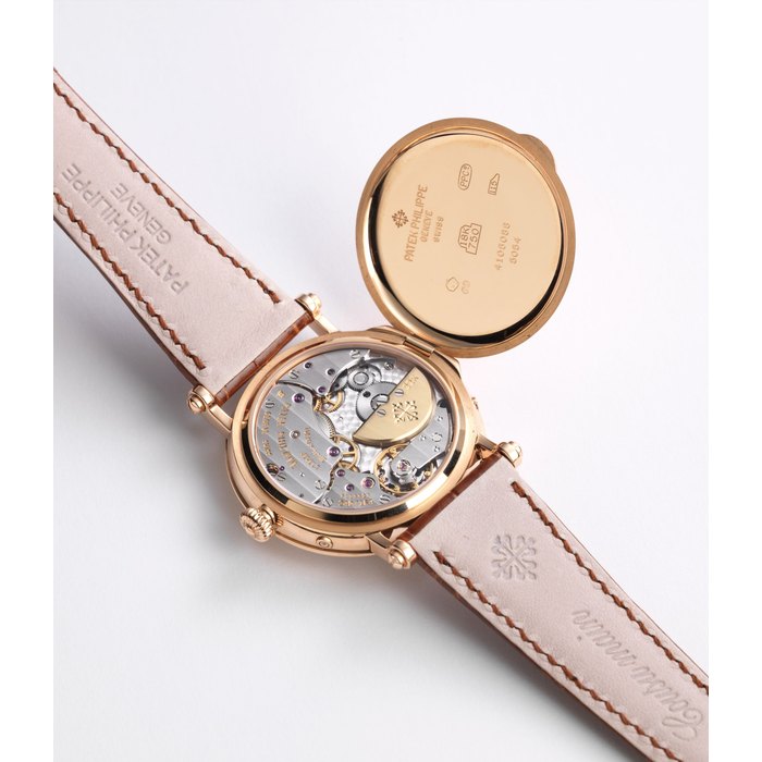 Patek Philippe. An 18K rose gold automatic calendar wristwatch with moon phase and power reserve Ref:5054R, Case No.4105088, Movement No.3113323, Sold 5th June 2000